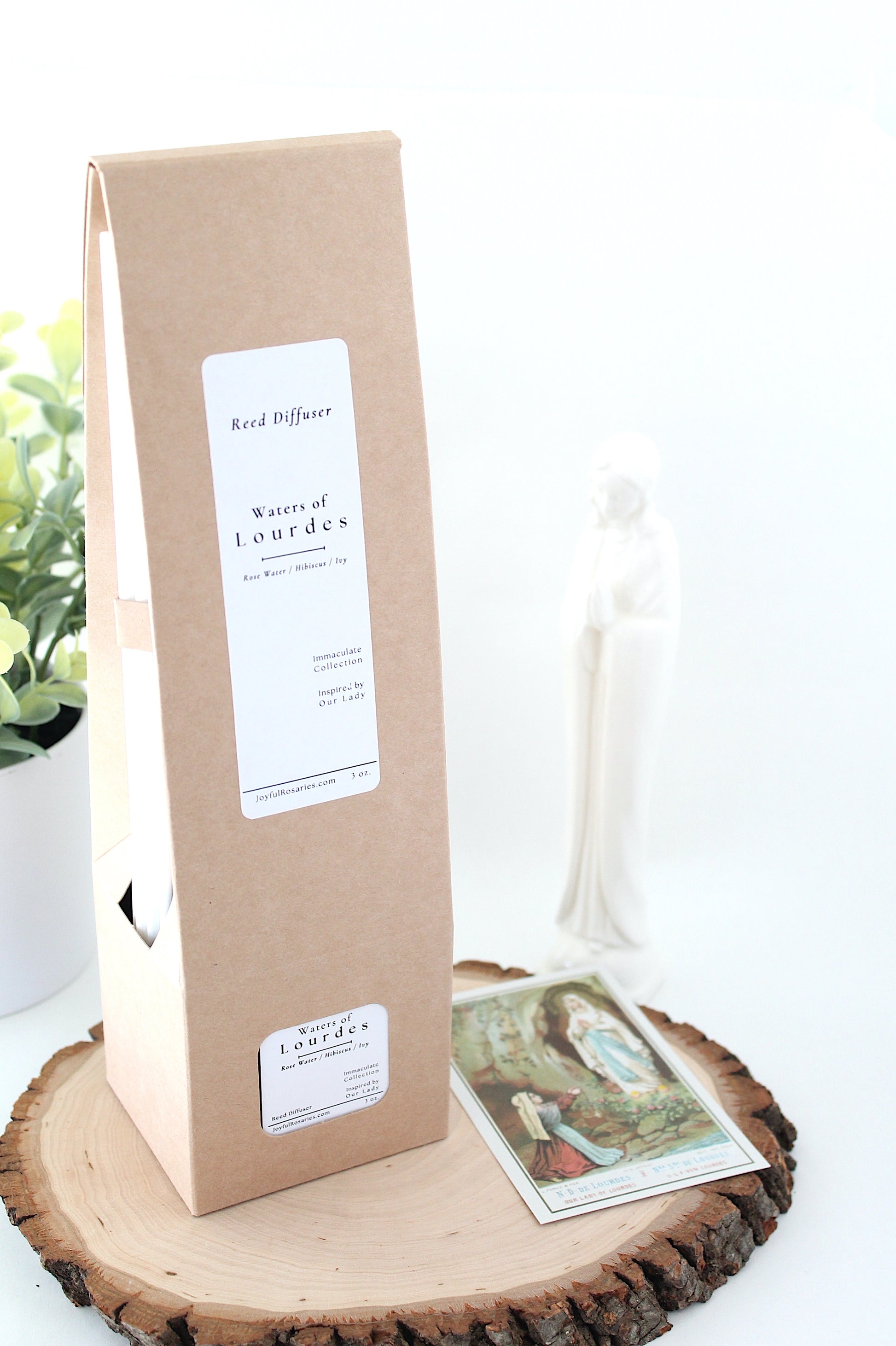 Reed Diffuser Kraft paper gift box with a label on a wooden surface